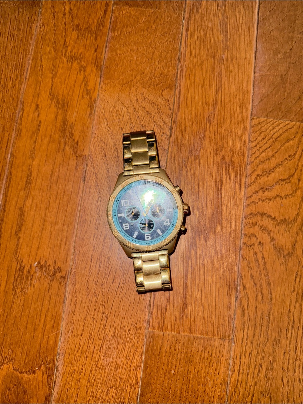 Gold Tone Metal Chronograph Watch with Blue Dial